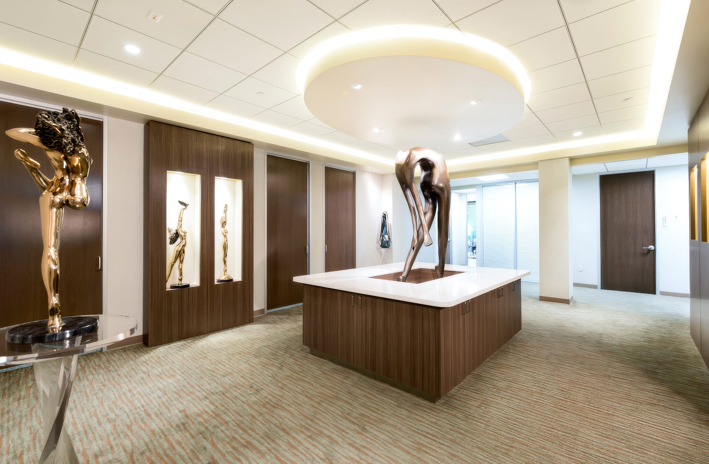 The Town & Country Plastic Surgeons reception area, a bronze sculpture on the front desk