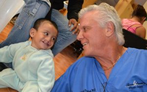Dr. Yarish with Happy Baby Boy with Cleft Lip Before His Reconstructive Surgery